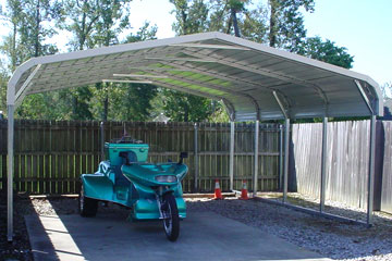 Metal carport in Christianburg, VA with a curved roof.