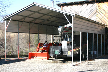 A metal carport can house any equimpent of valuable belongings 